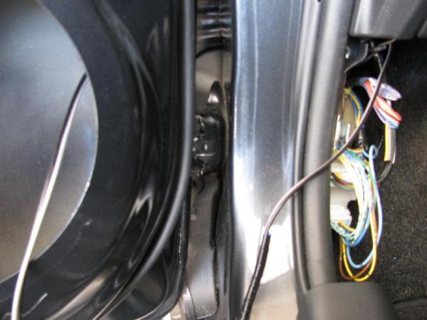 New speaker wire run through door boot.