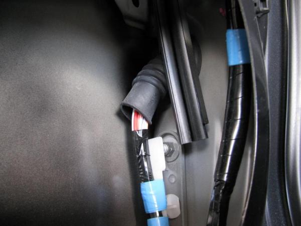 Rubber door boot from inside door, need to run the new speaker wire though it.